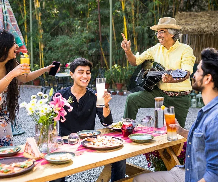 Family enjoying a weekend Getaway near delhi - karma chalets.